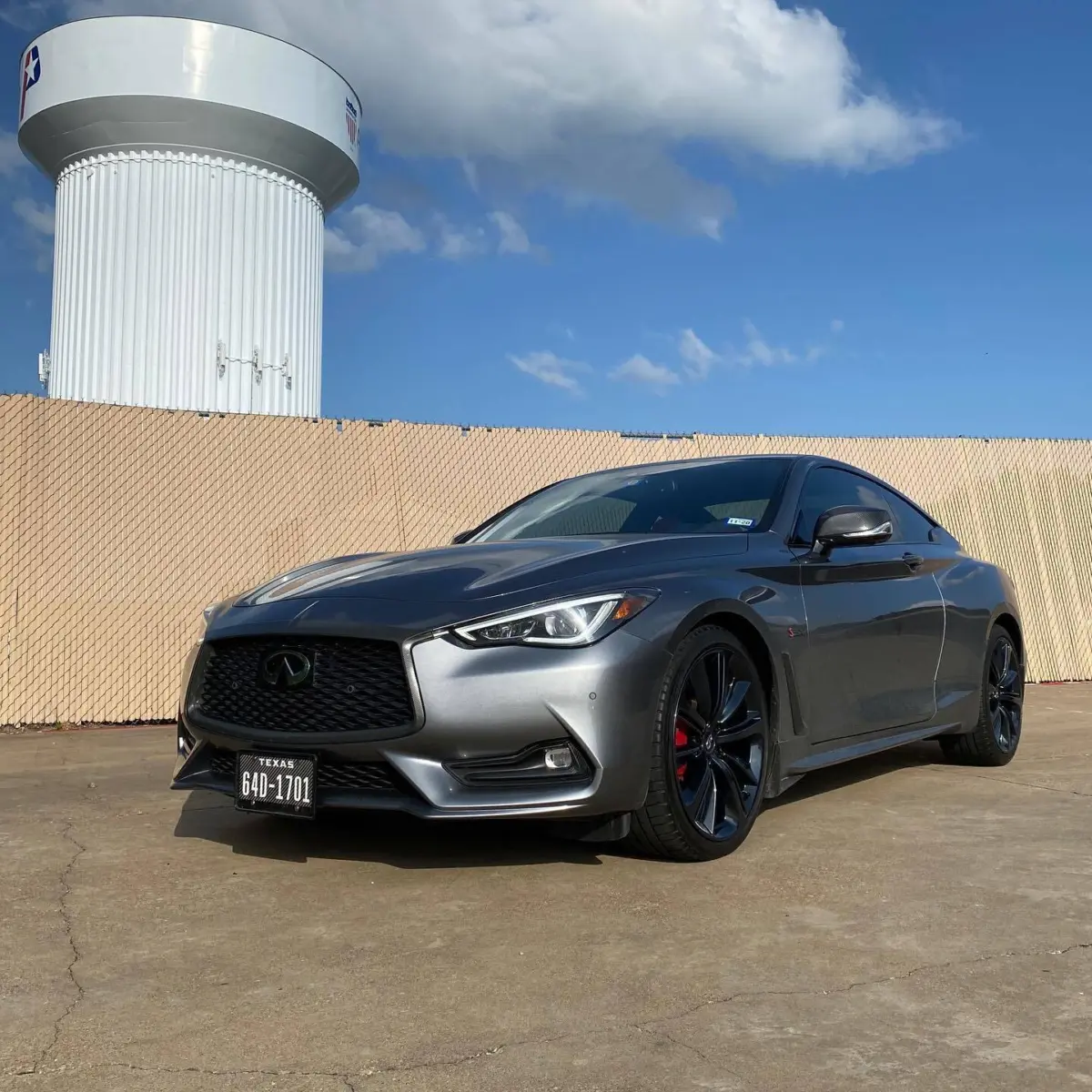 Infiniti Q60S wheels refinished in Black Metallic