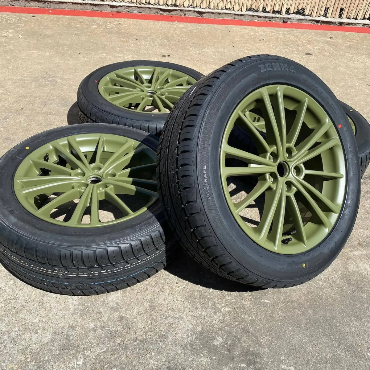 Subaru wheels refinished in Army Green