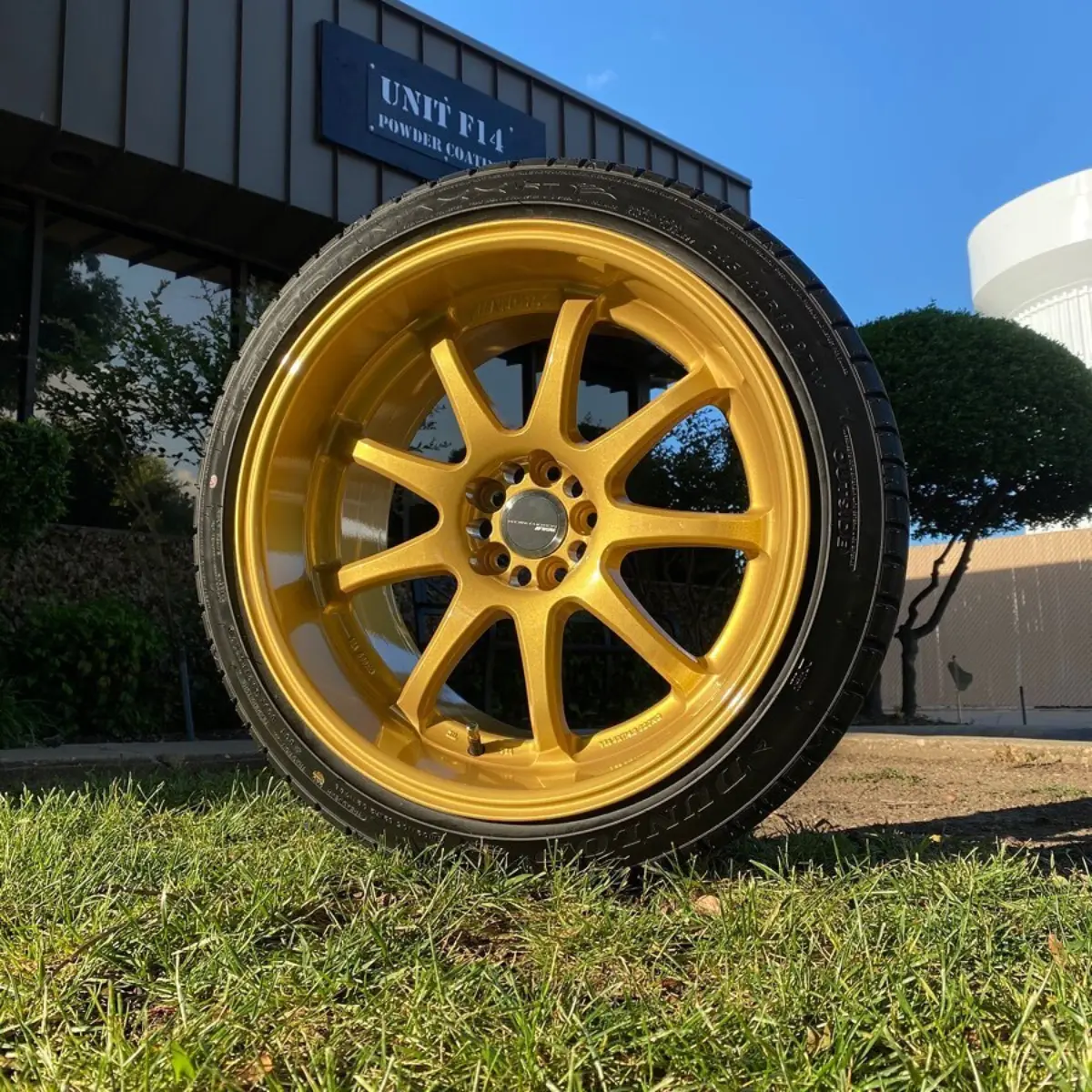 Work wheels refinished in Goldastic. After stripping, we discovered the previous shop used an overly aggressive blast media leaving a pitted profile. Nothing a little primer can’t fix
