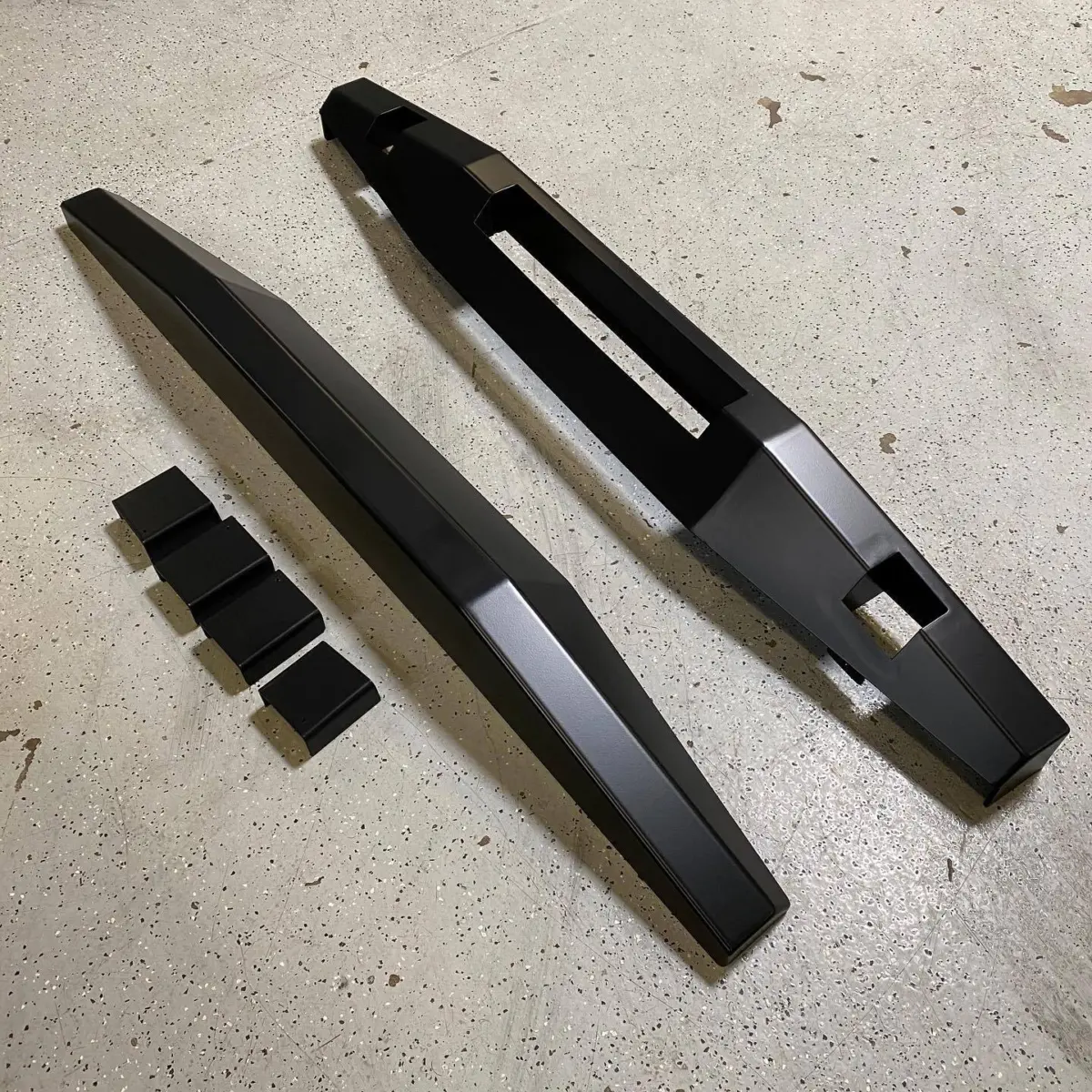 Bumpers refinished in Black Magic