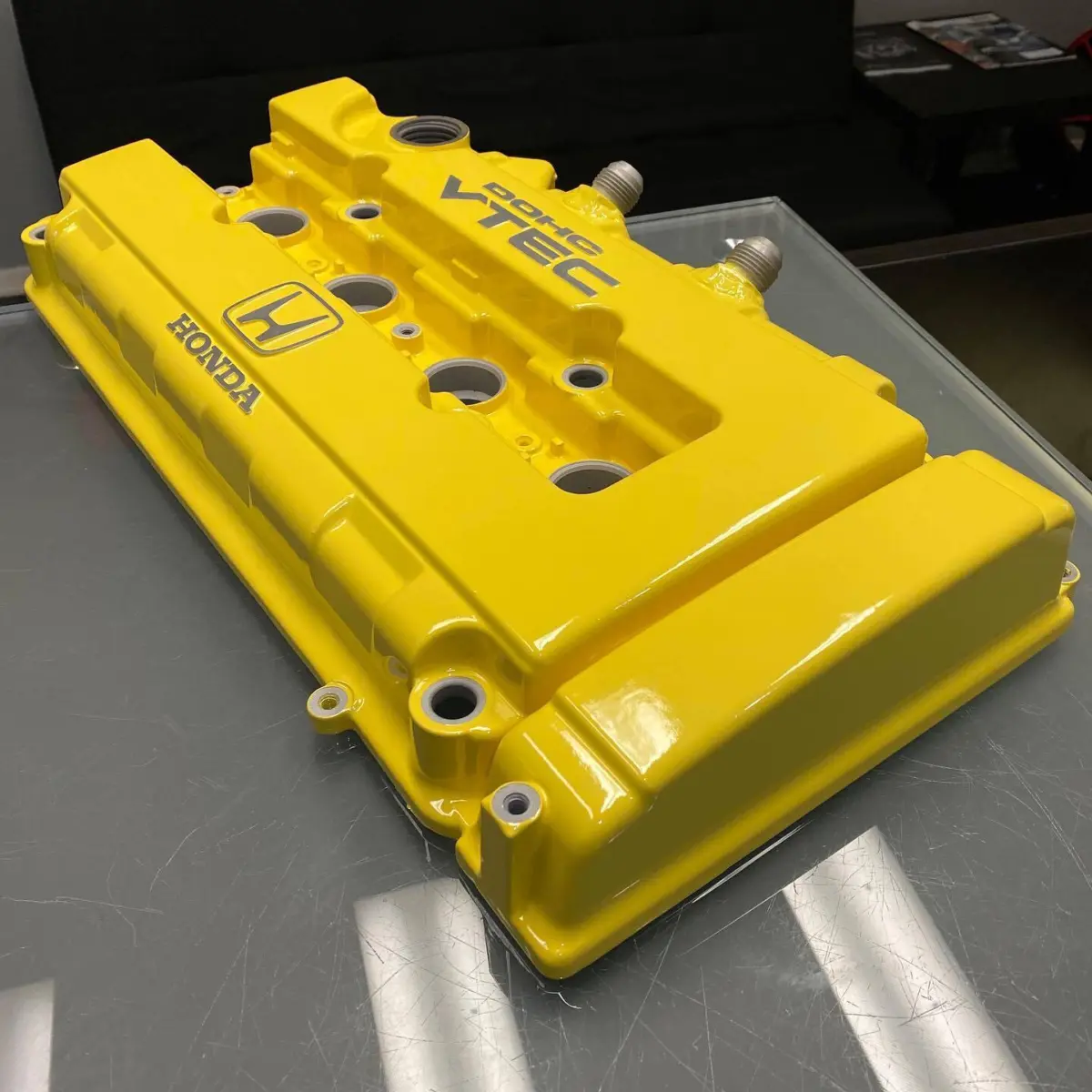 Honda valve cover refinished in spoon yellow for @dc2envy