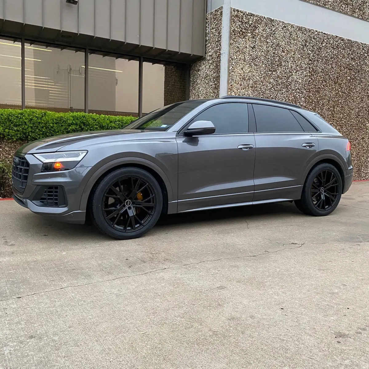 2019 Audi Q8 brake calipers refinished in Illusion Spanish Fly along with lowering springs, 22” wheels, and fresh tires for @eddro757