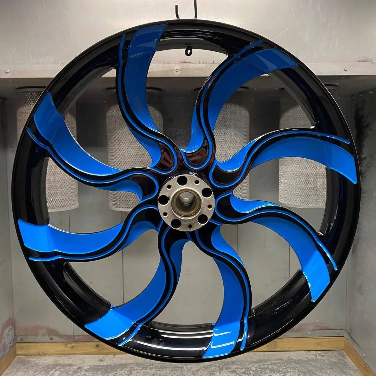 Harley Davidson wheels refinished in Wet Black and Playboy Blue