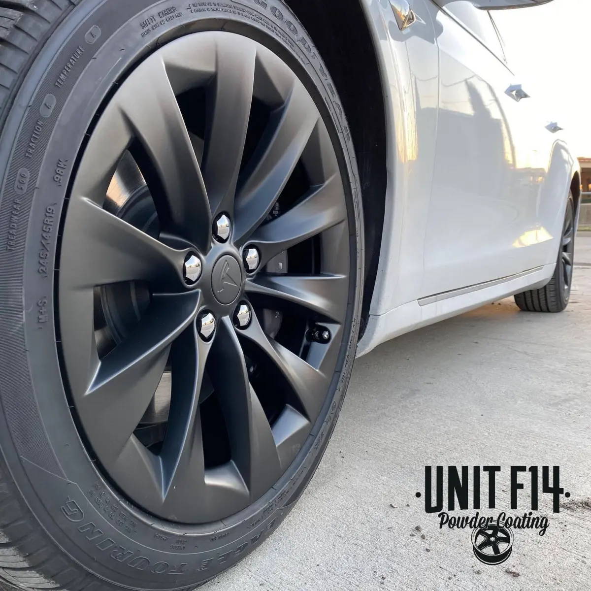 Tesla Model S wheels refinished in Denim Black