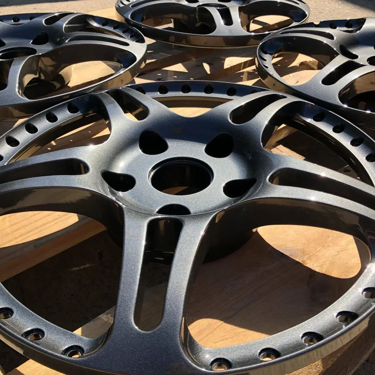 HRE wheel faces refinished in a Dark Metallic Gunmetal with High Gloss Clear
