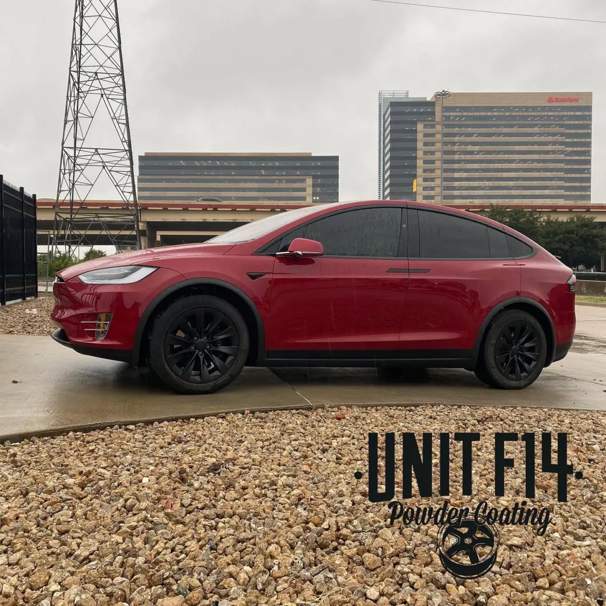 Tesla Model X wheels refinished in a Denim Black