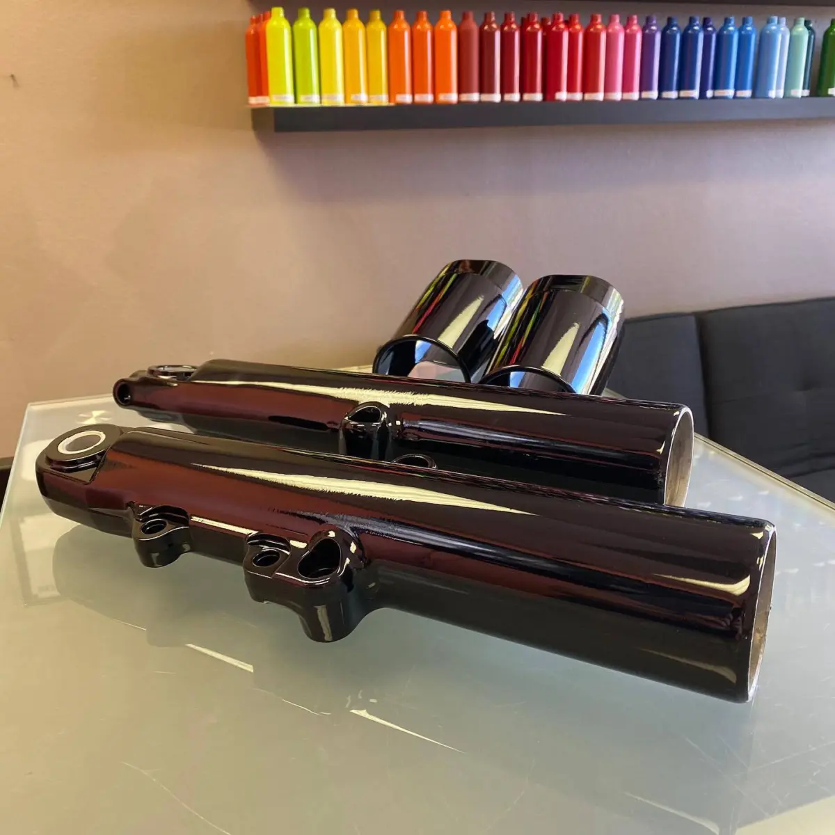 Harley Davidson front forks and cowbells refinished in Wet Black