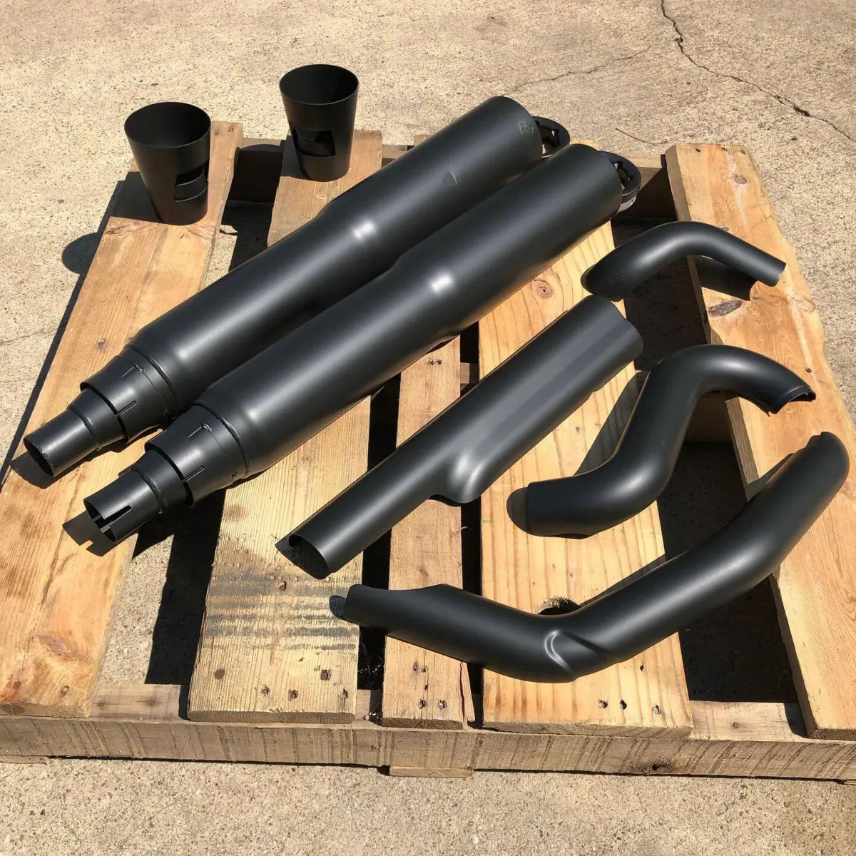 Vance & Hines exhausts refinished in Glacier Black Cerakote