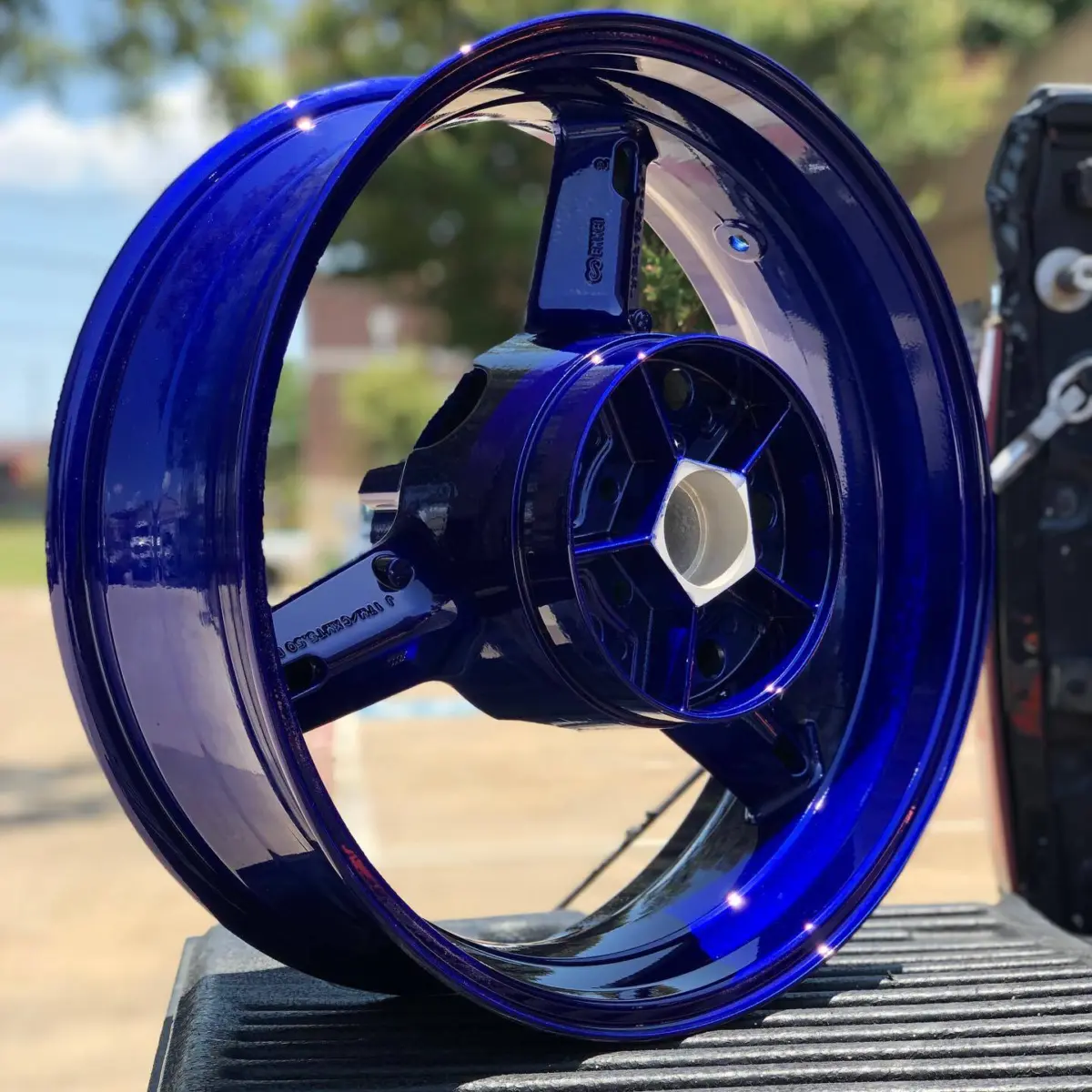 Motorcycle wheel refinished in Illusion Royal