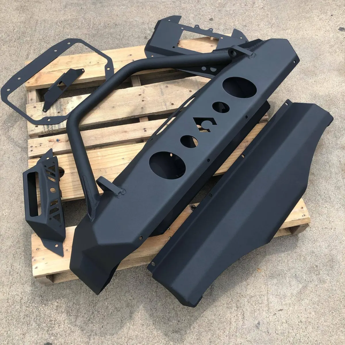 Jeep bumper and rear tire delete powder coated in a Zinc Primer and Texture Black