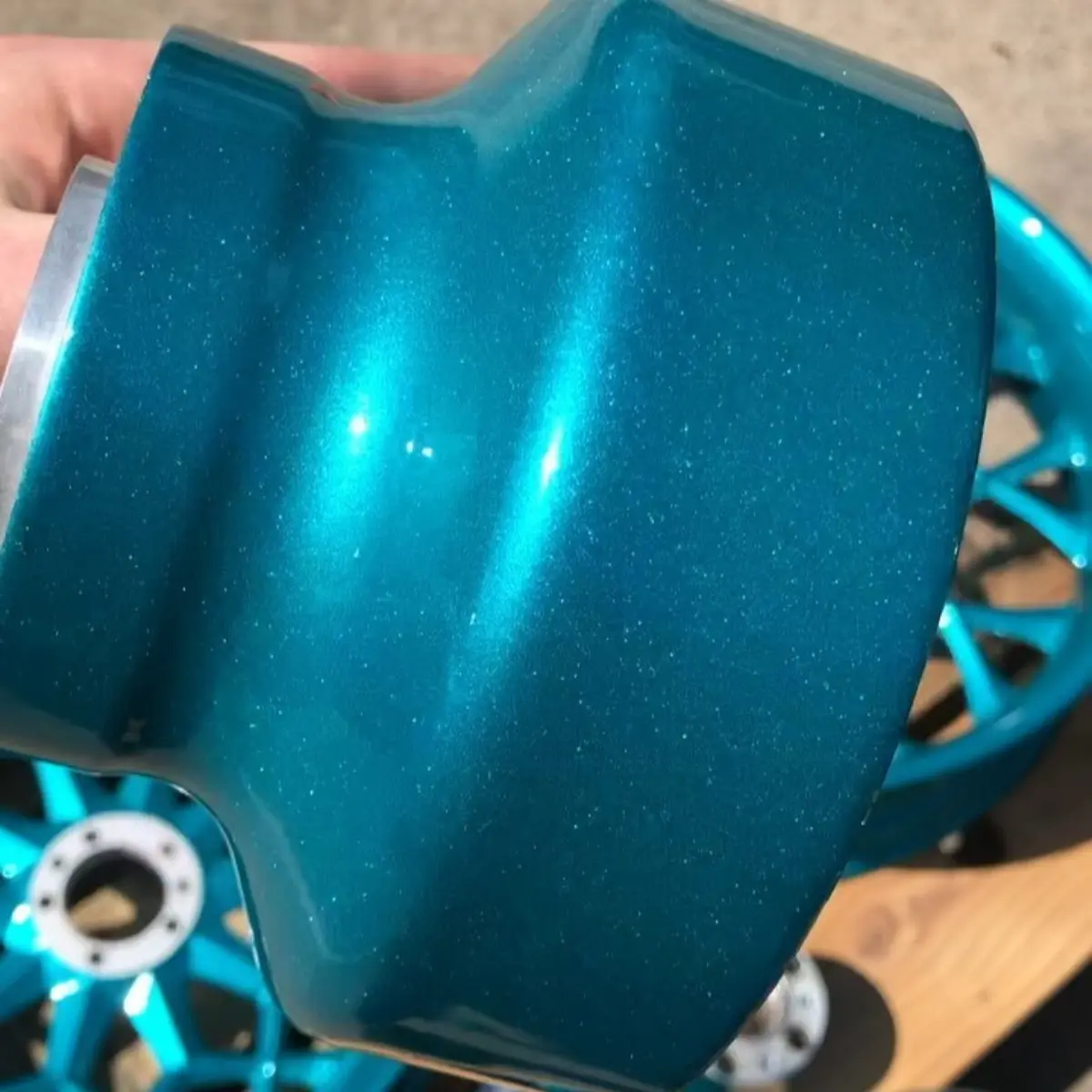 Harley Davidson wheels refinished in Metallic Teal for @northtexasvtwin and @heith20