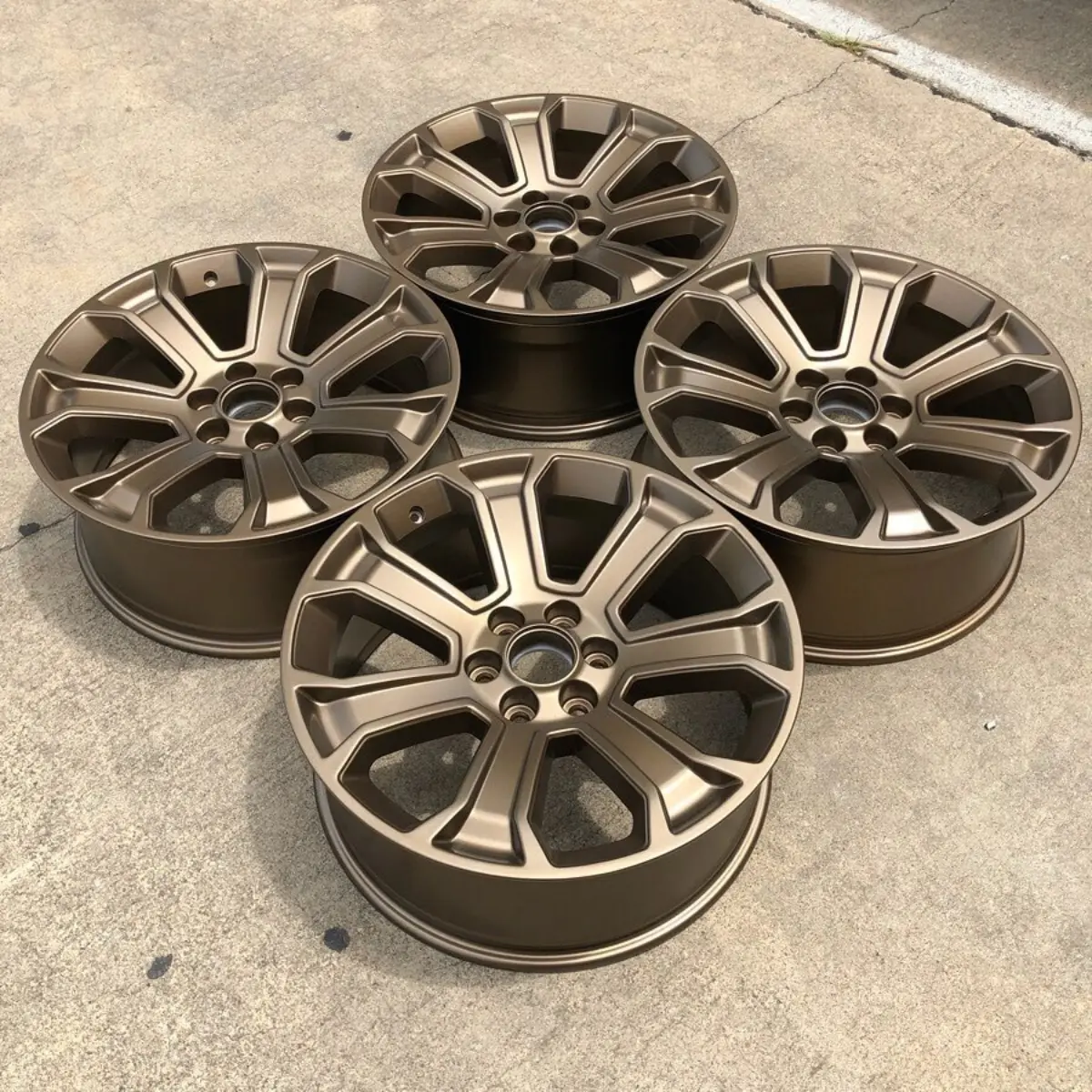 Chevrolet Silverado 22” wheels refinished in a Satin Golden Bronze for @shelton.salter