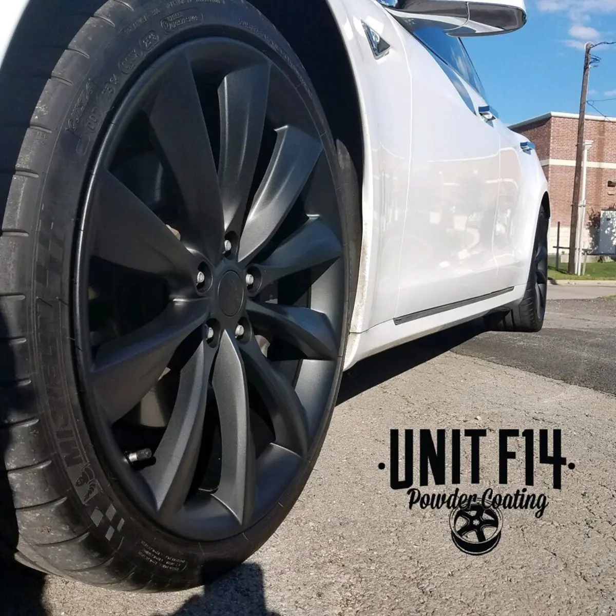 Tesla Model 3 wheels refinished in Matte Black