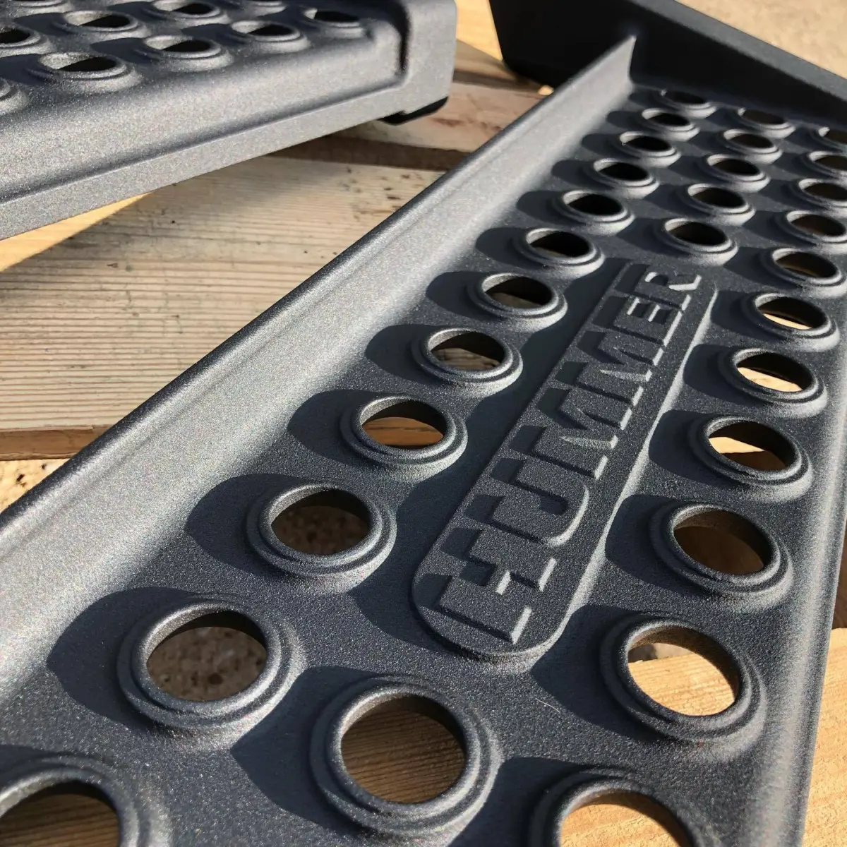 Hummer side steps refinished in texture black powder coat