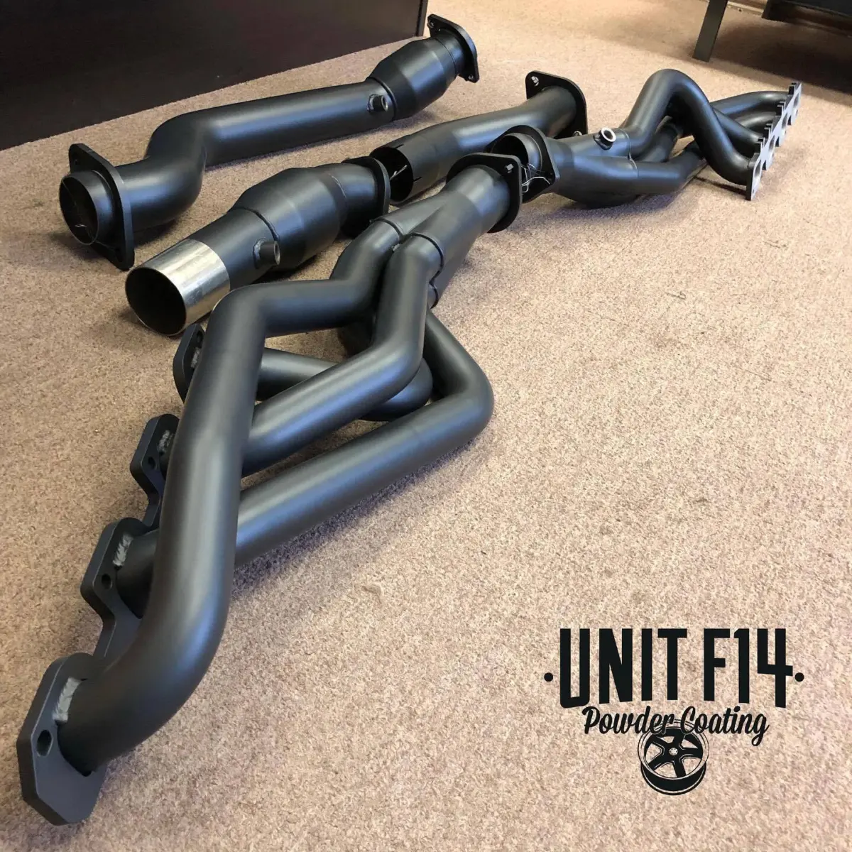Jeep Track-hawk headers and piping refinished in Glacier Black Cerakote