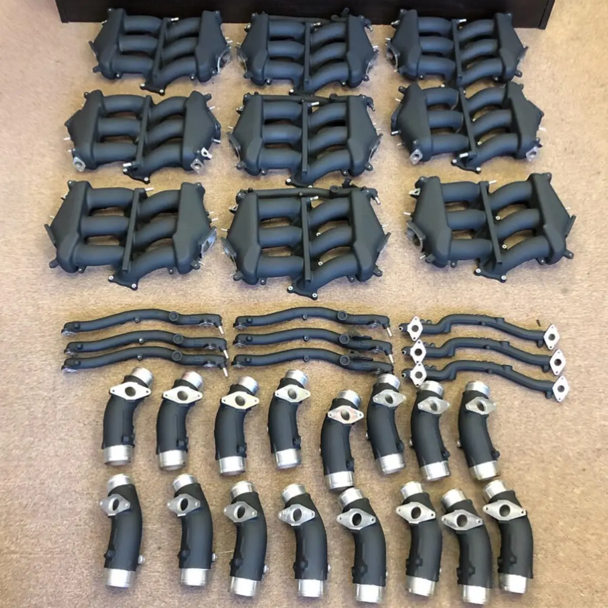 Nissan GT-R intake manifolds and piping powder coated in texture black for @jotechmotorsports. Swipe to see the process!
