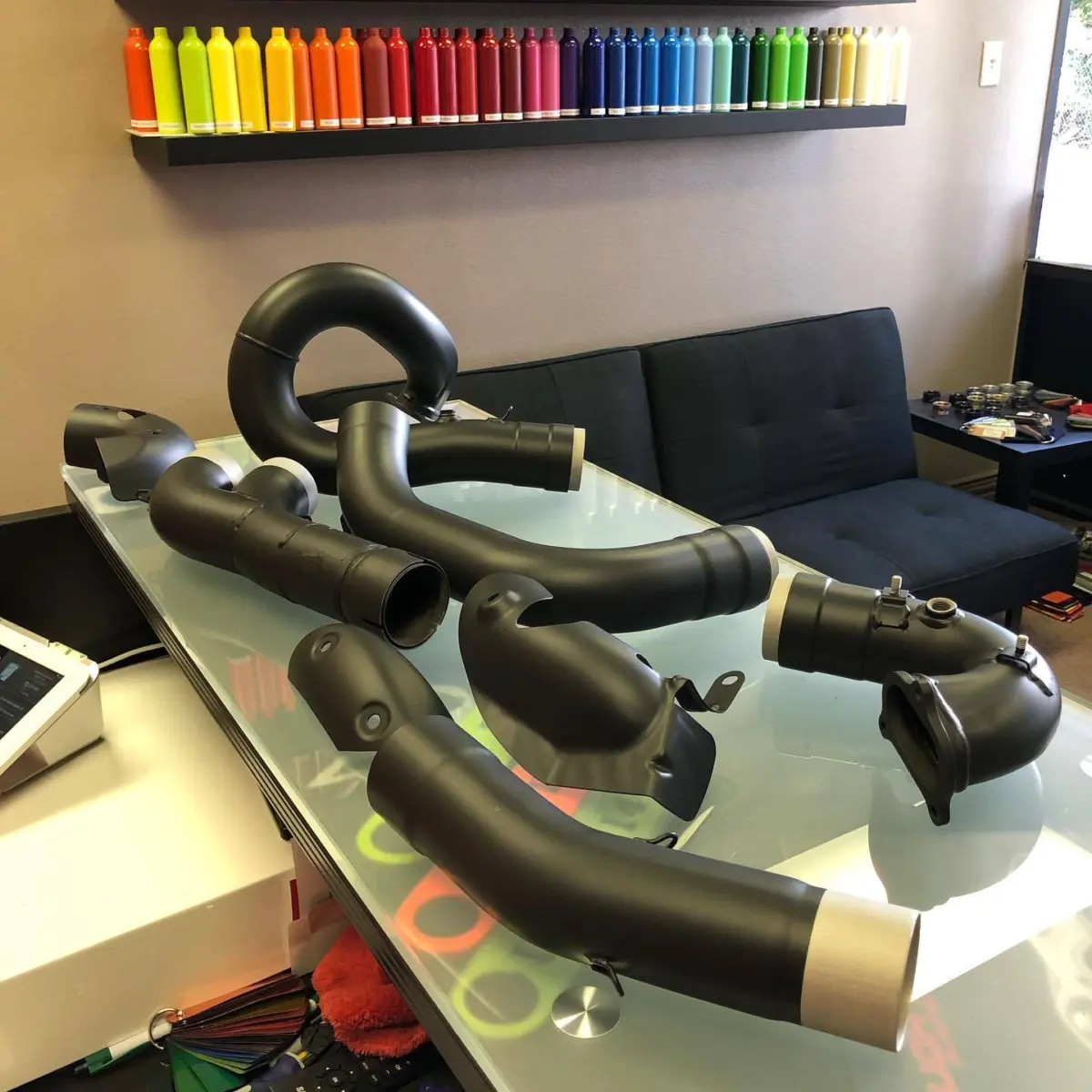 Ducati exhaust refinished in Glacier Black Cerakote