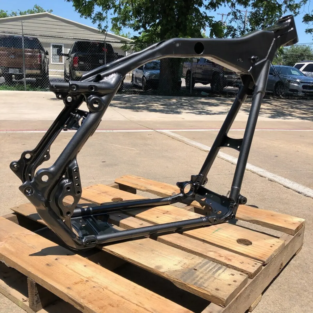 Custom Harley frame refinished in a dark metallic gunmetal for @northtexasvtwin and @heith20