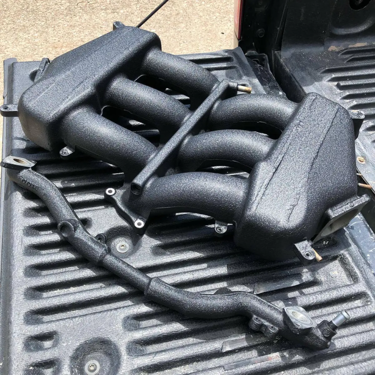 Nissan GT-R intake manifold refinished in Wrinkle Black for @jotechmotorsports