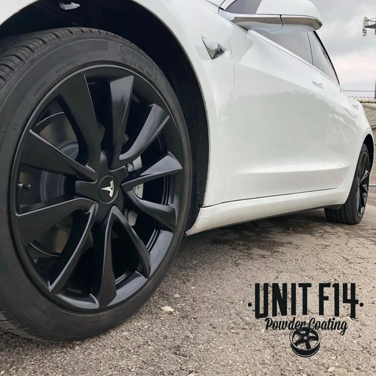 Tesla Model 3 wheels refinished in Semigloss Black