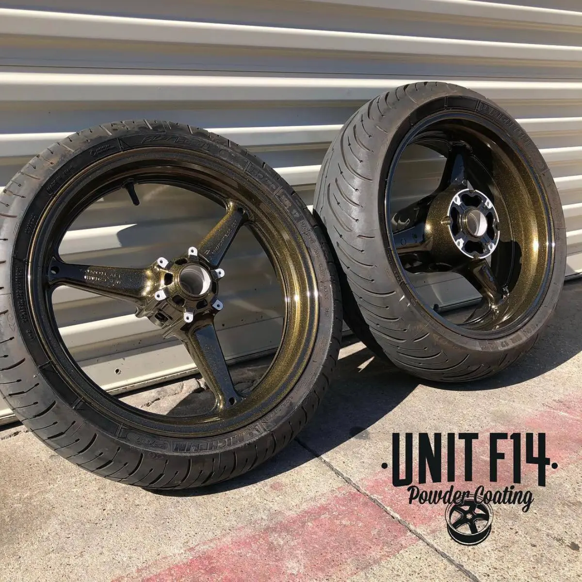 Motorcycle wheels refinish in @prismaticpowders King Midas over Black