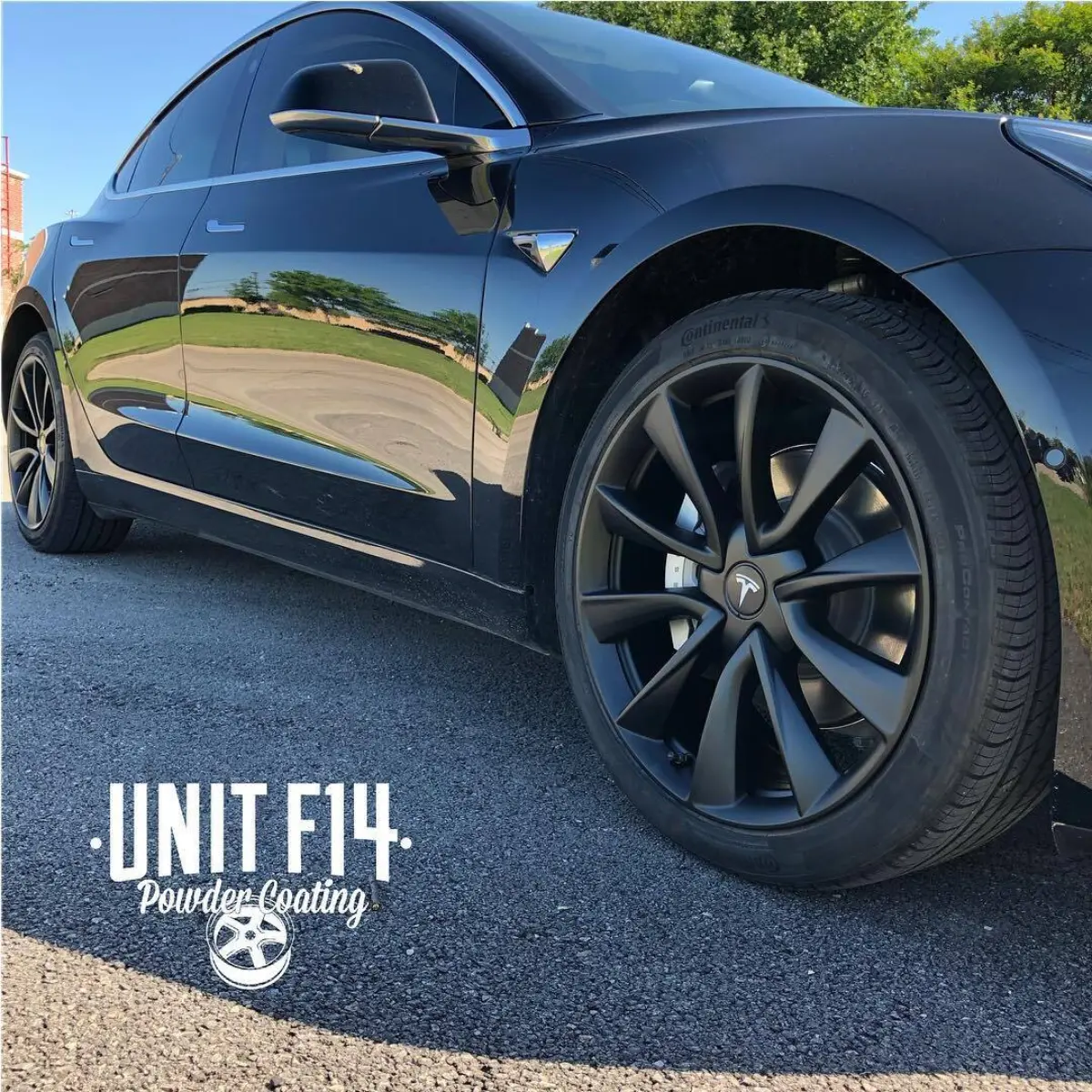 Tesla Model 3 wheels refinished in Denim Black