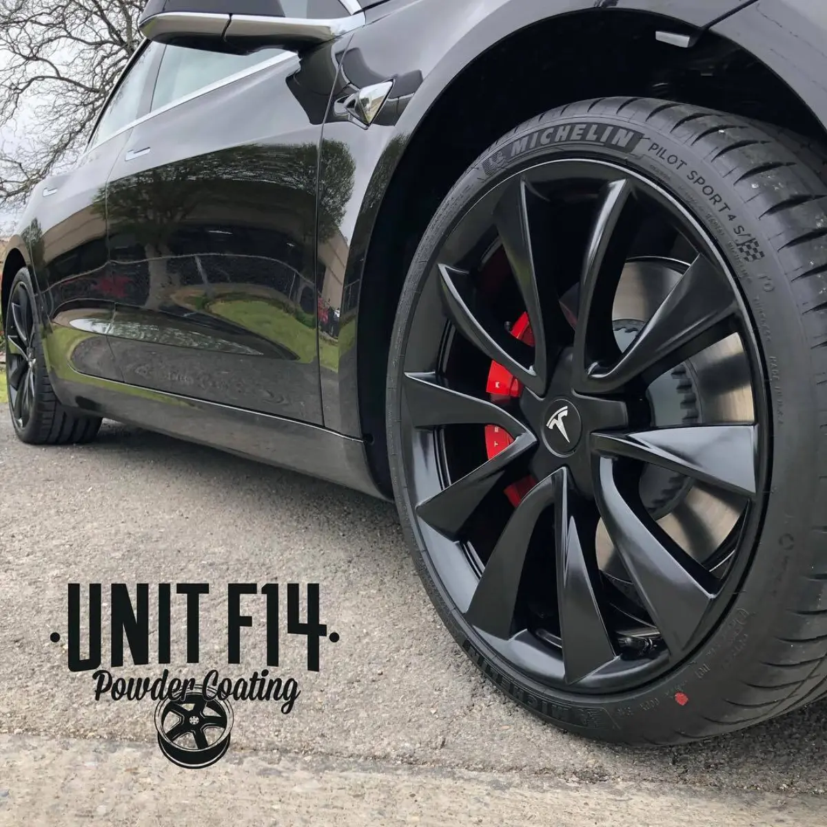 Tesla Model 3 wheels refinished in Semigloss Black