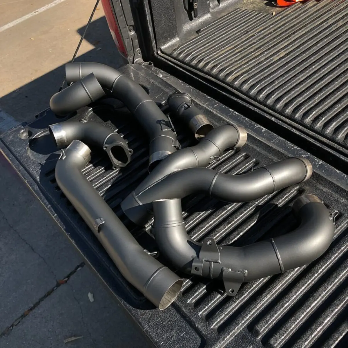 Ducati exhaust in a 95/5 Black and Silver Cerakote mix