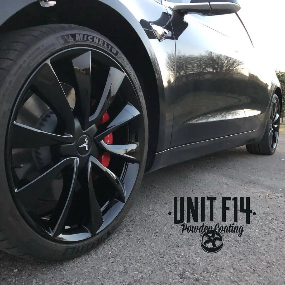 Tesla Model 3 with Wet Black wheels