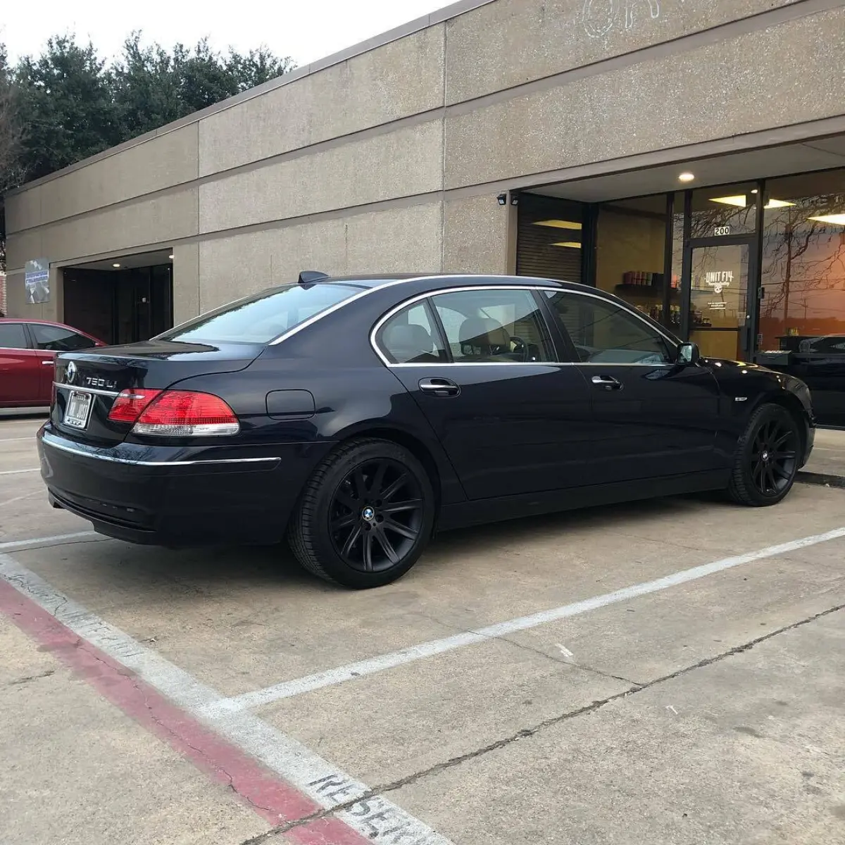 BMW 750 Li wheels refinished in Denim Black