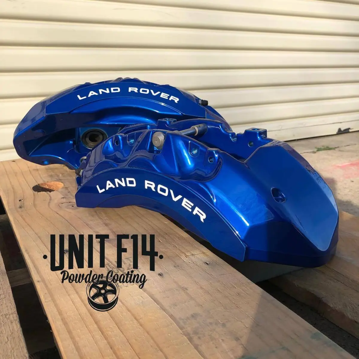 Land Rover brake calipers rebuilt and refinished in Candy Blue