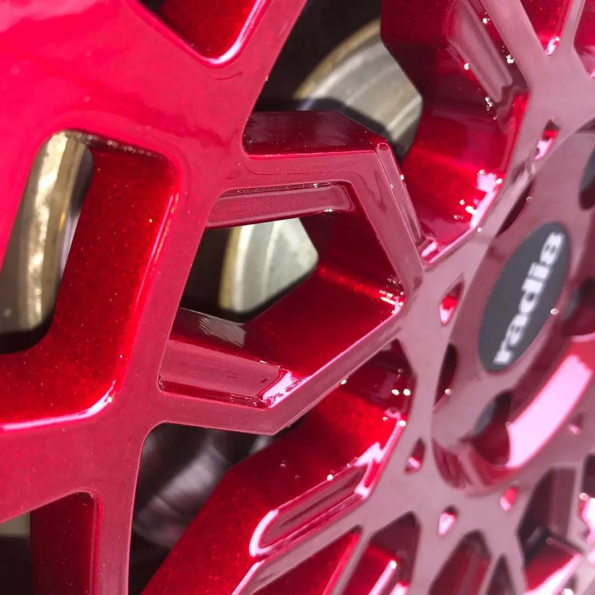 Wheels refinished in a 3-stage metallic red for this Volkswagen Golf GTI