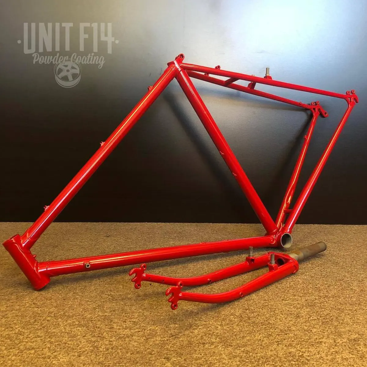 Bicycle frame refinished in our house red