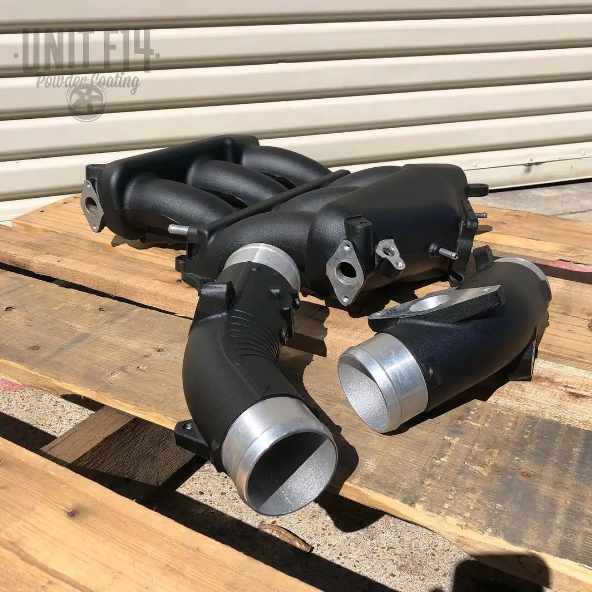 Intake manifold and piping in texture black
