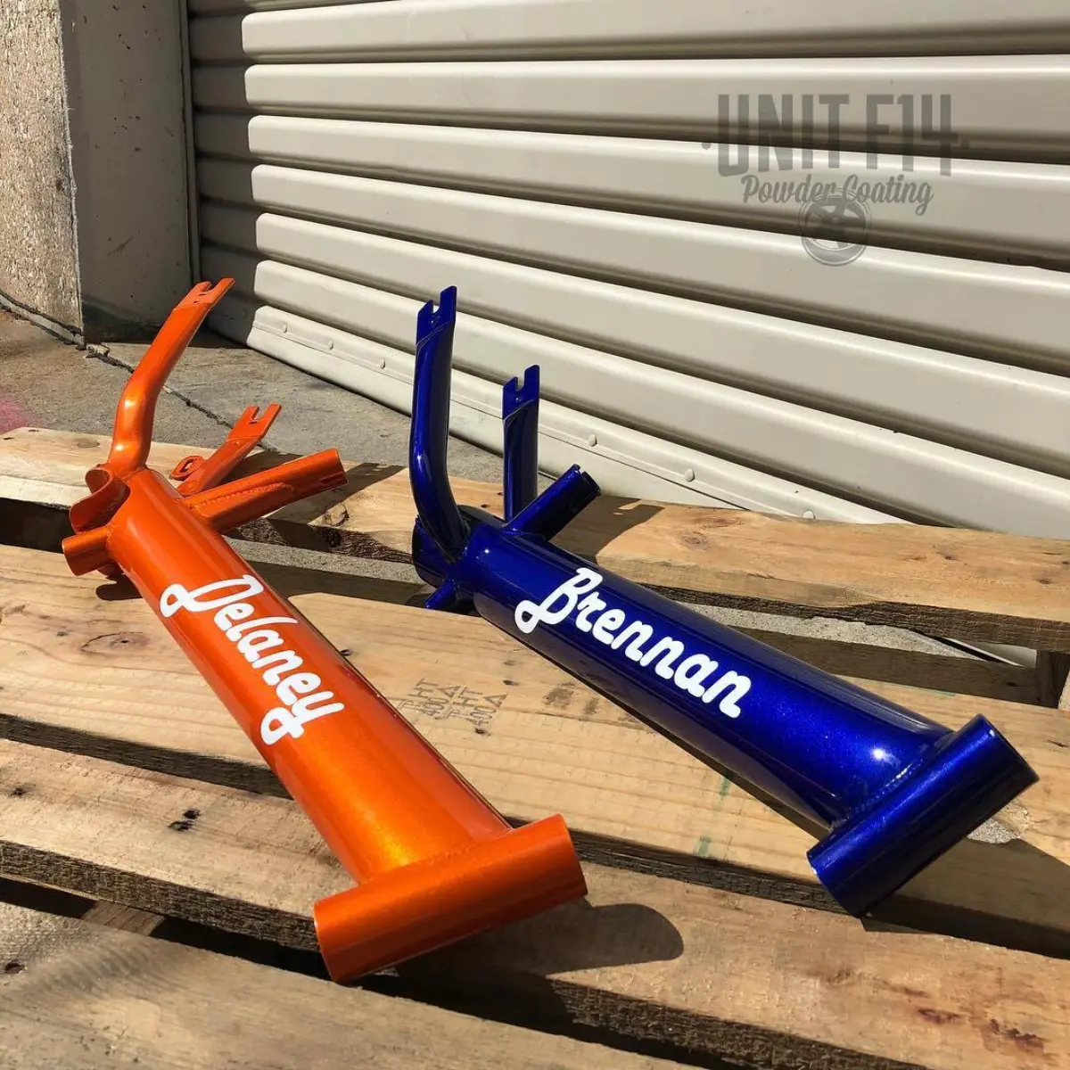 A couple strider bikes in Illusion Orange and Illusion Royal with decals provided in-house
