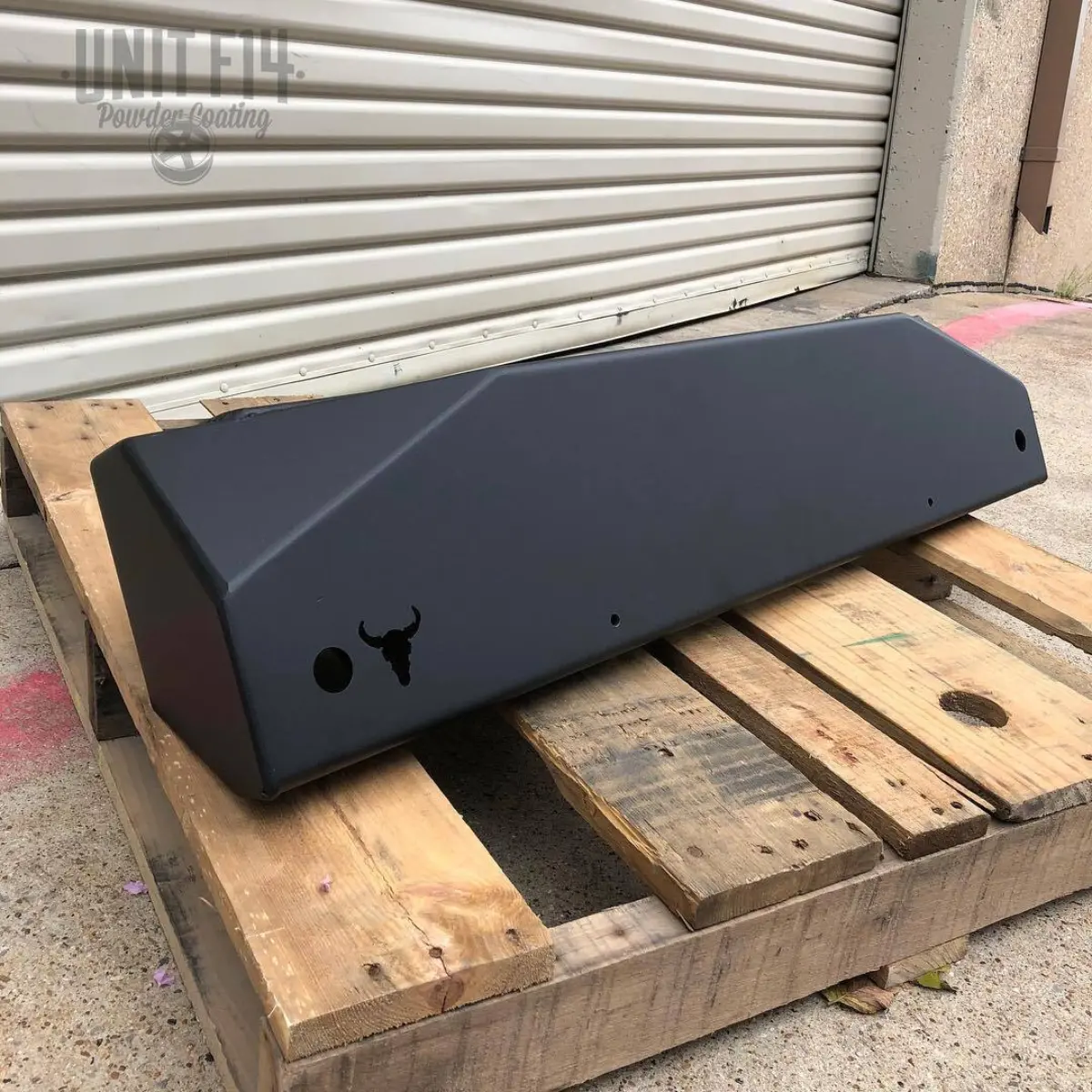 Bumper refinished in Texture Black