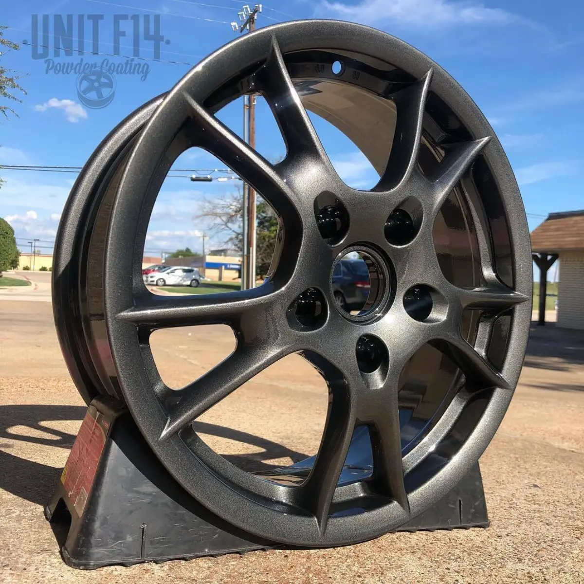 Porsche Boxster wheels refinished in a Dark metallic gunmetal