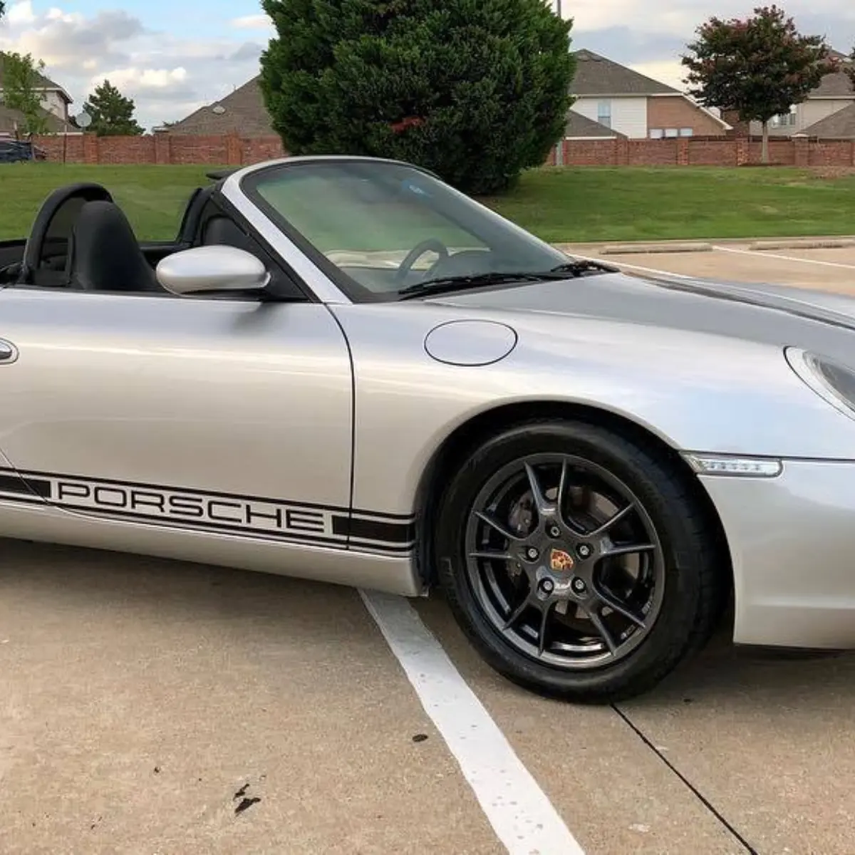 Porsche Boxster wheels refinished in a Dark metallic gunmetal