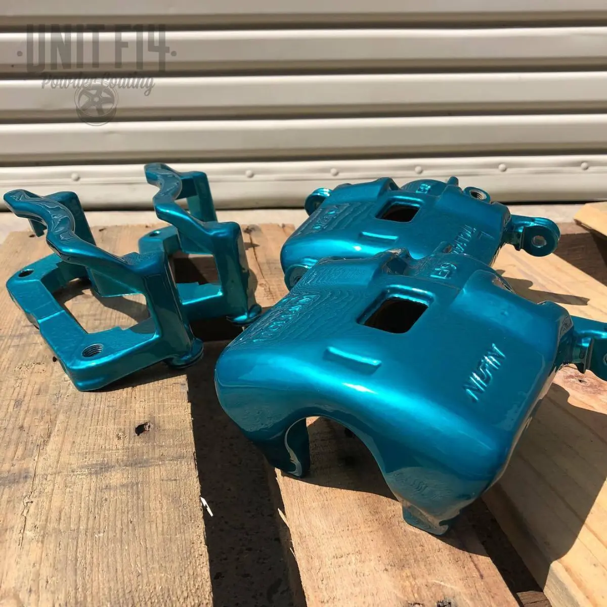 Brake calipers rebuilt and finished in Candy Teal