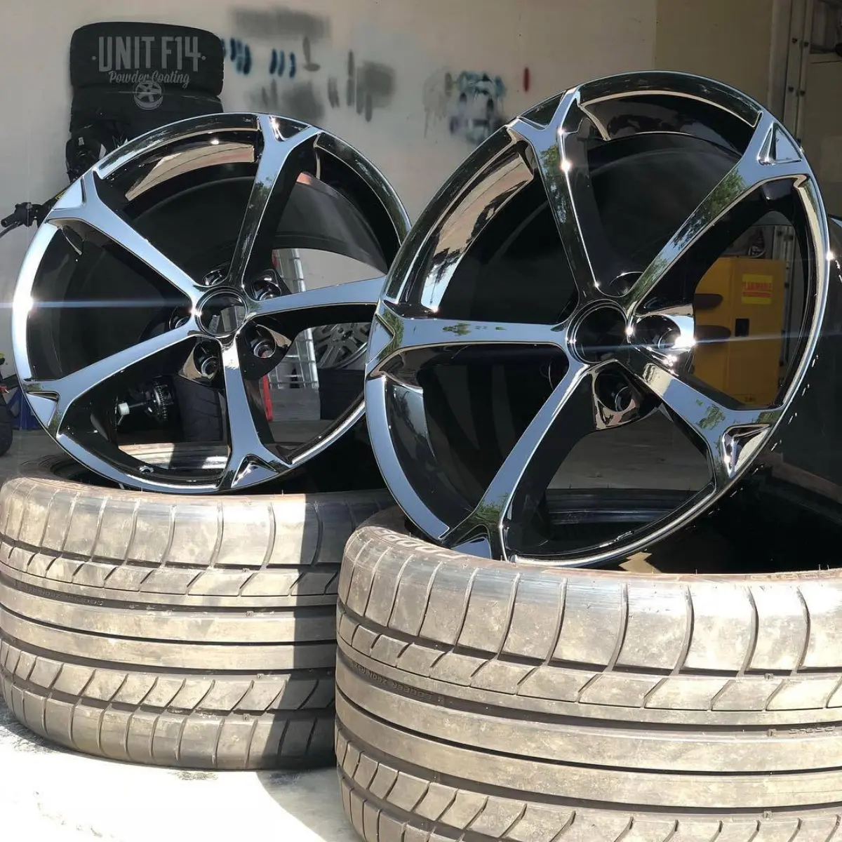 Corvette wheels refinished in Wet Black