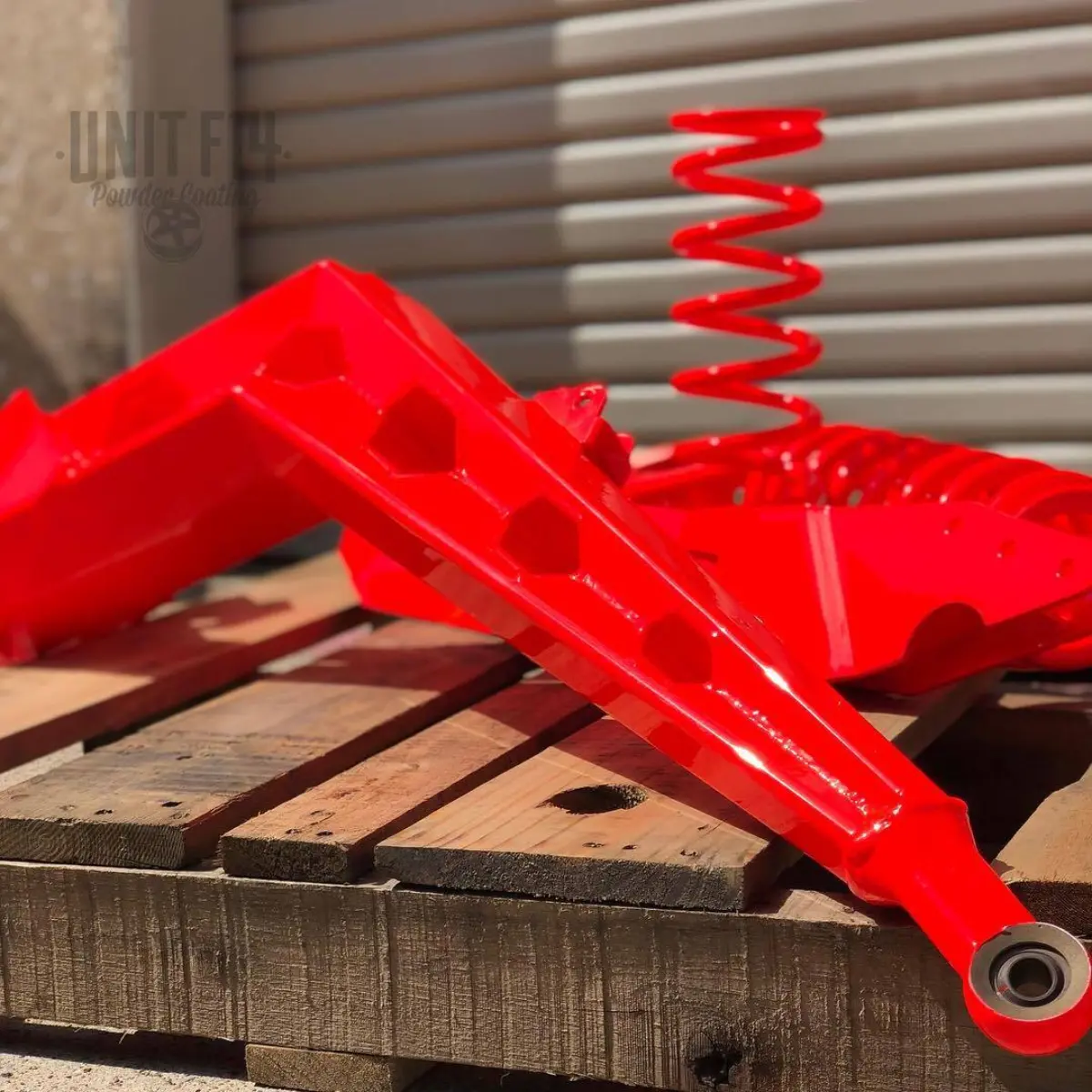 Fluorescent Red practically glowing in the sunlight on a 10” ATV lift kit