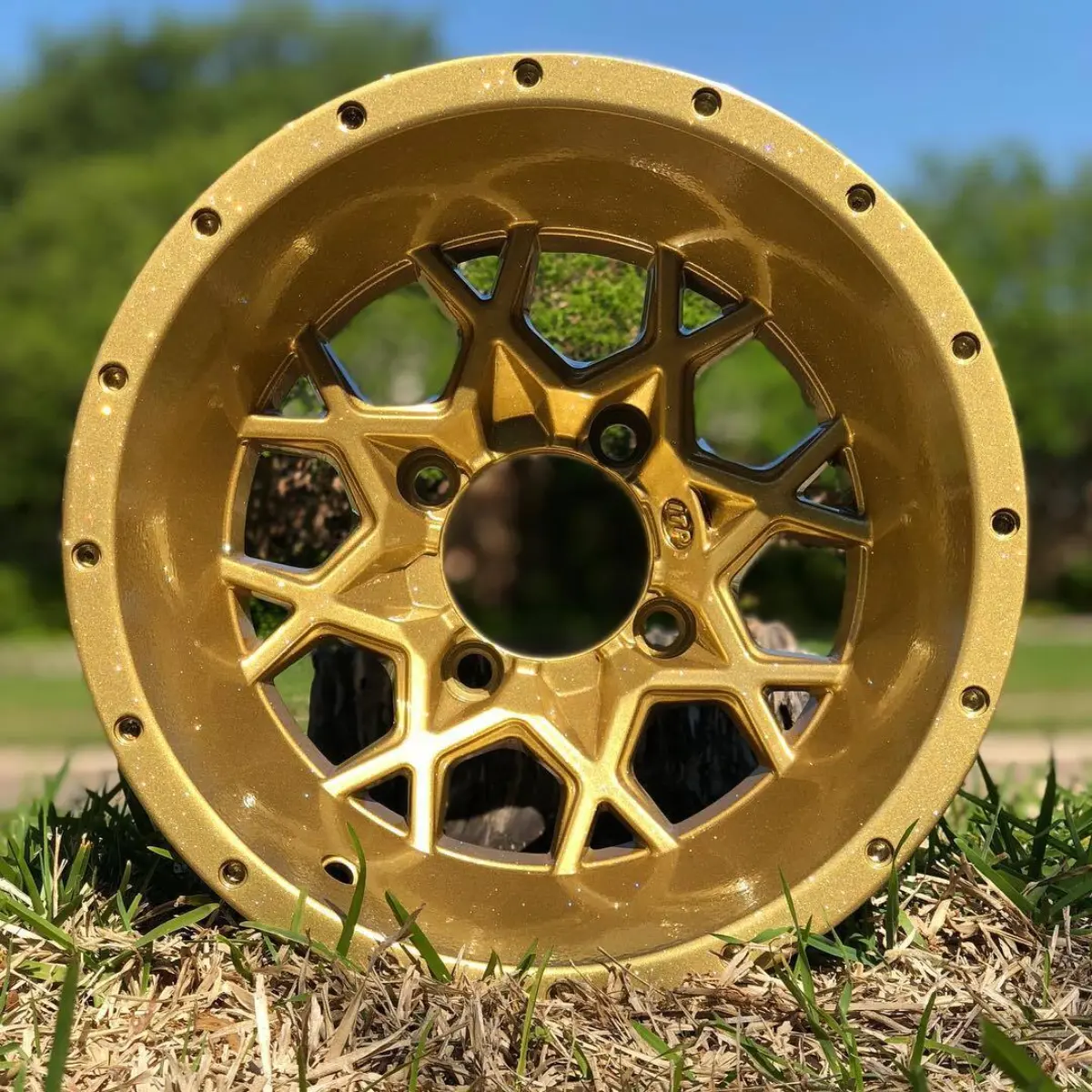 ITP Hurricane ATV wheels in a 2-stage metallic gold
