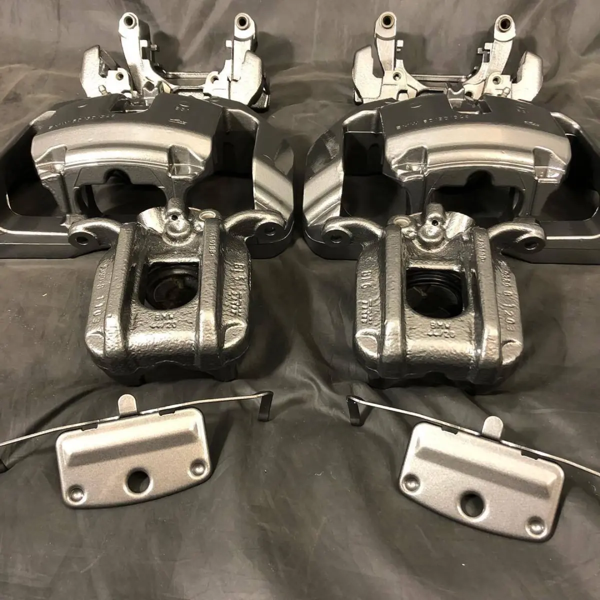 BMW 535i brake calipers mailed in from South Texas for a rebuild and fresh powder coat