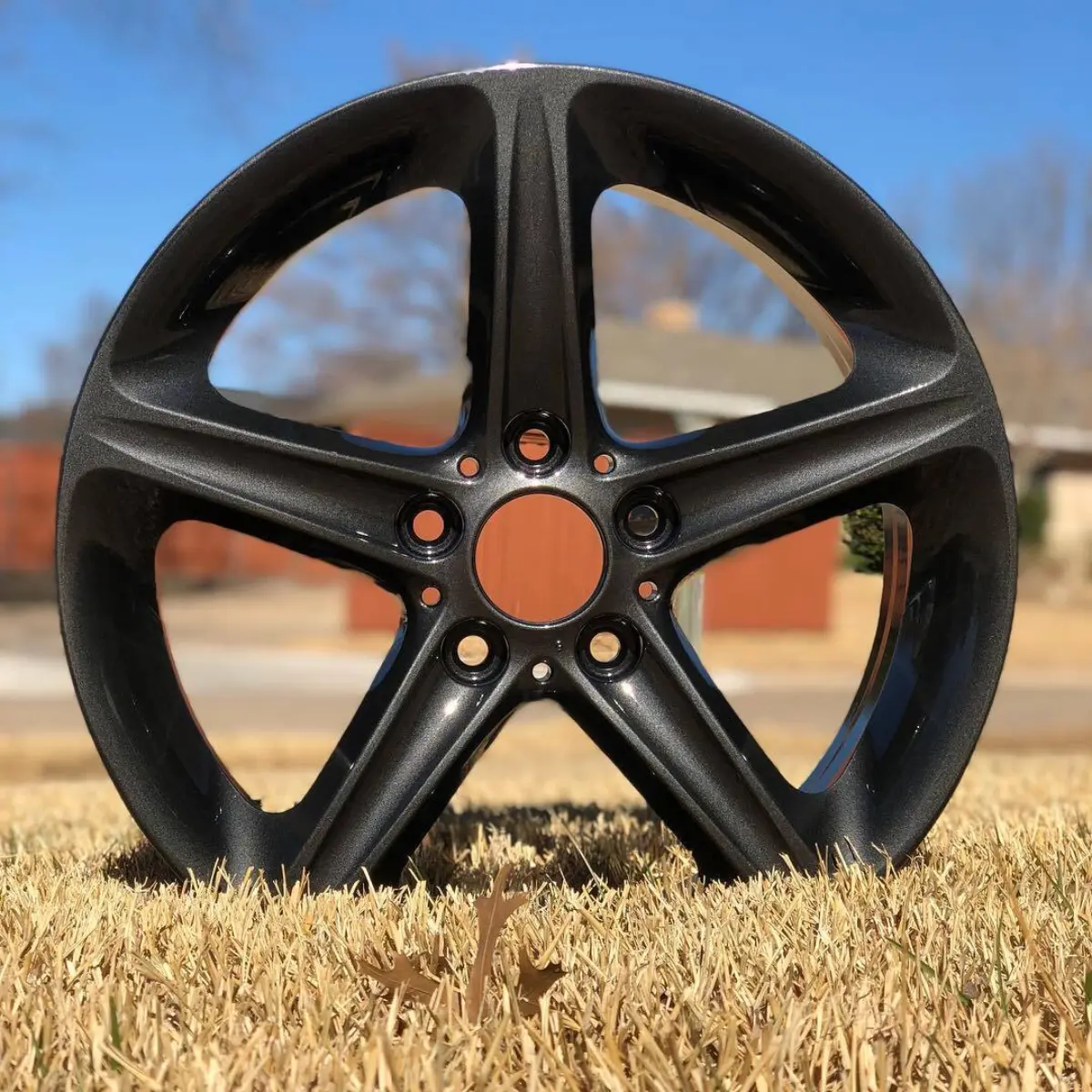 Dark metallic gunmetal and a high gloss clear for this set of BMW wheels