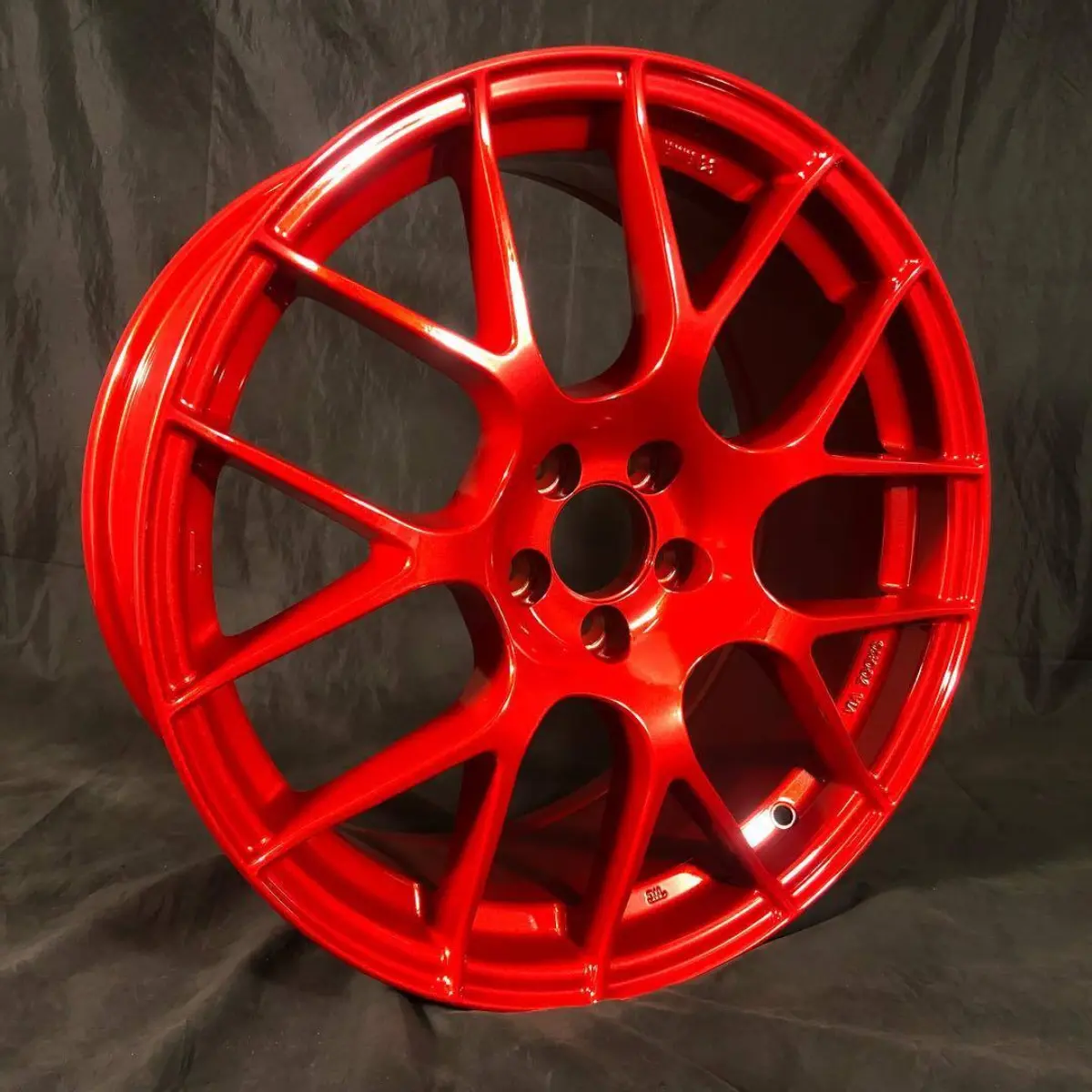 Enkei wheels powder coated in Illusion Red