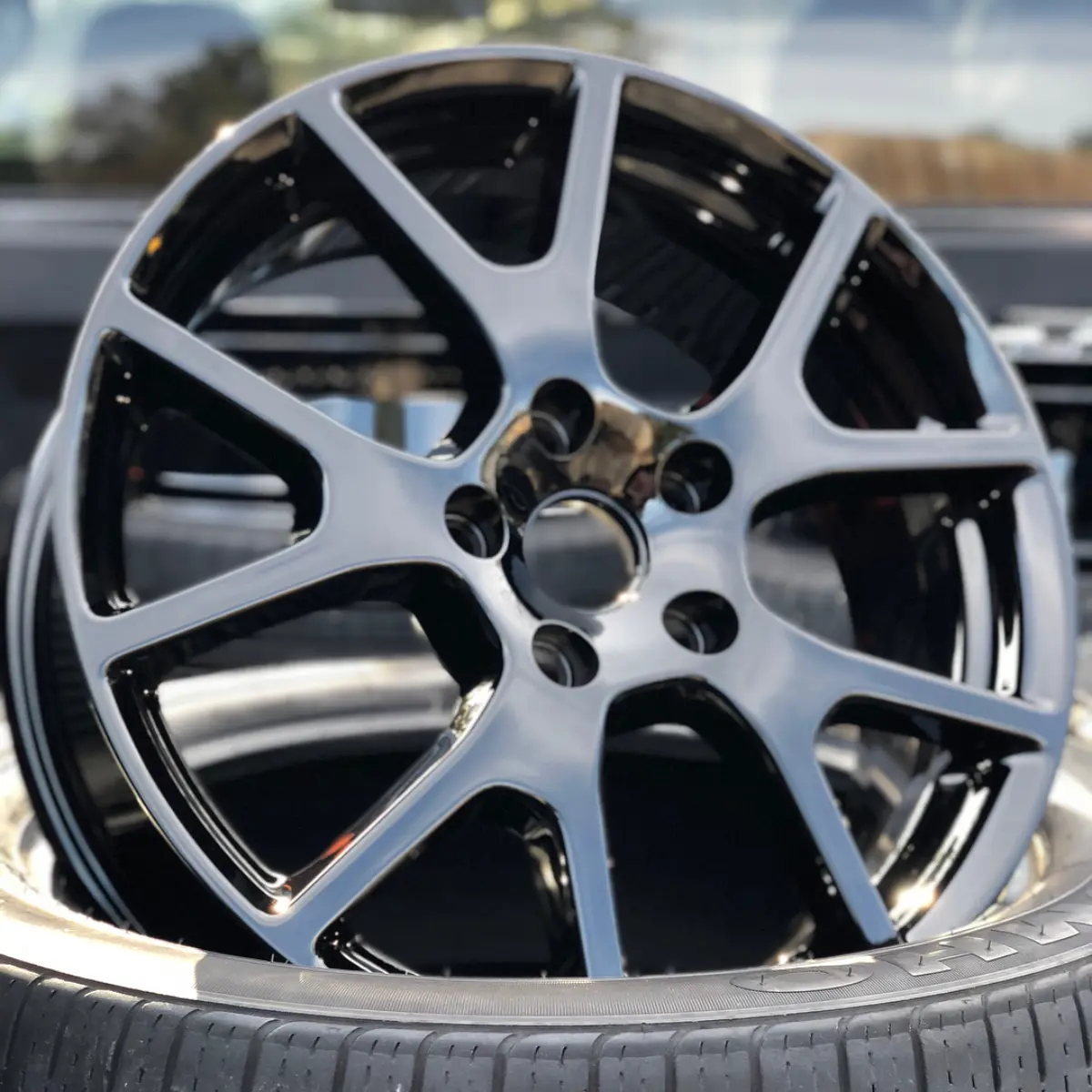 Wet Black wheels for a Dodge Journey