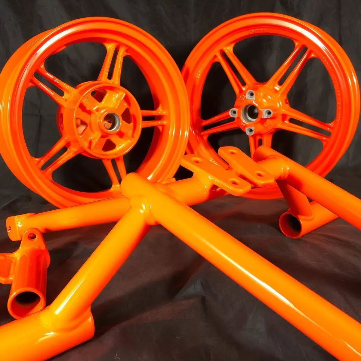 Kawasaki Z-125 parts in a 3-stage Fluorescent Orange