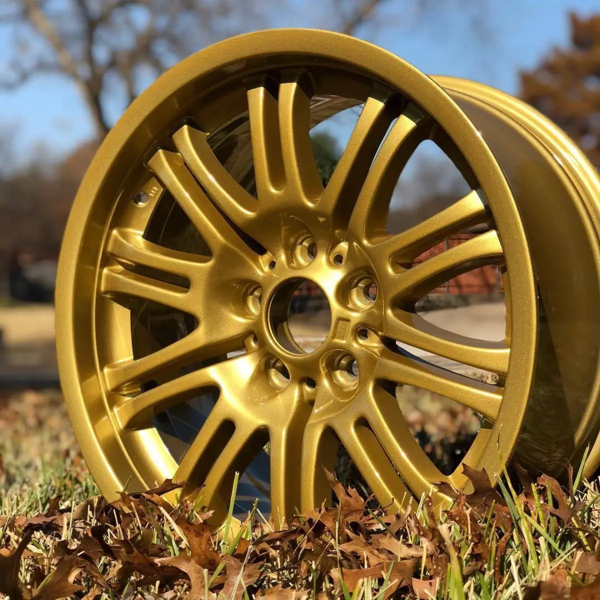 BMW wheels powder coated in a metallic gold with high gloss clear