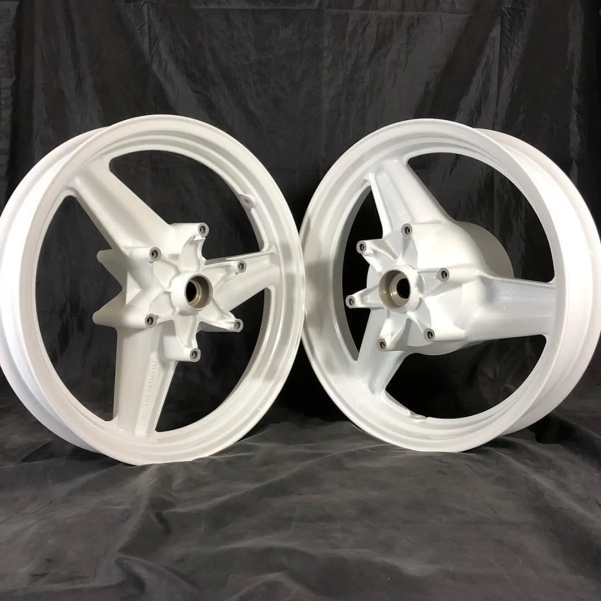 Honda Hurricane wheels restored in RAL-9016 with Clear