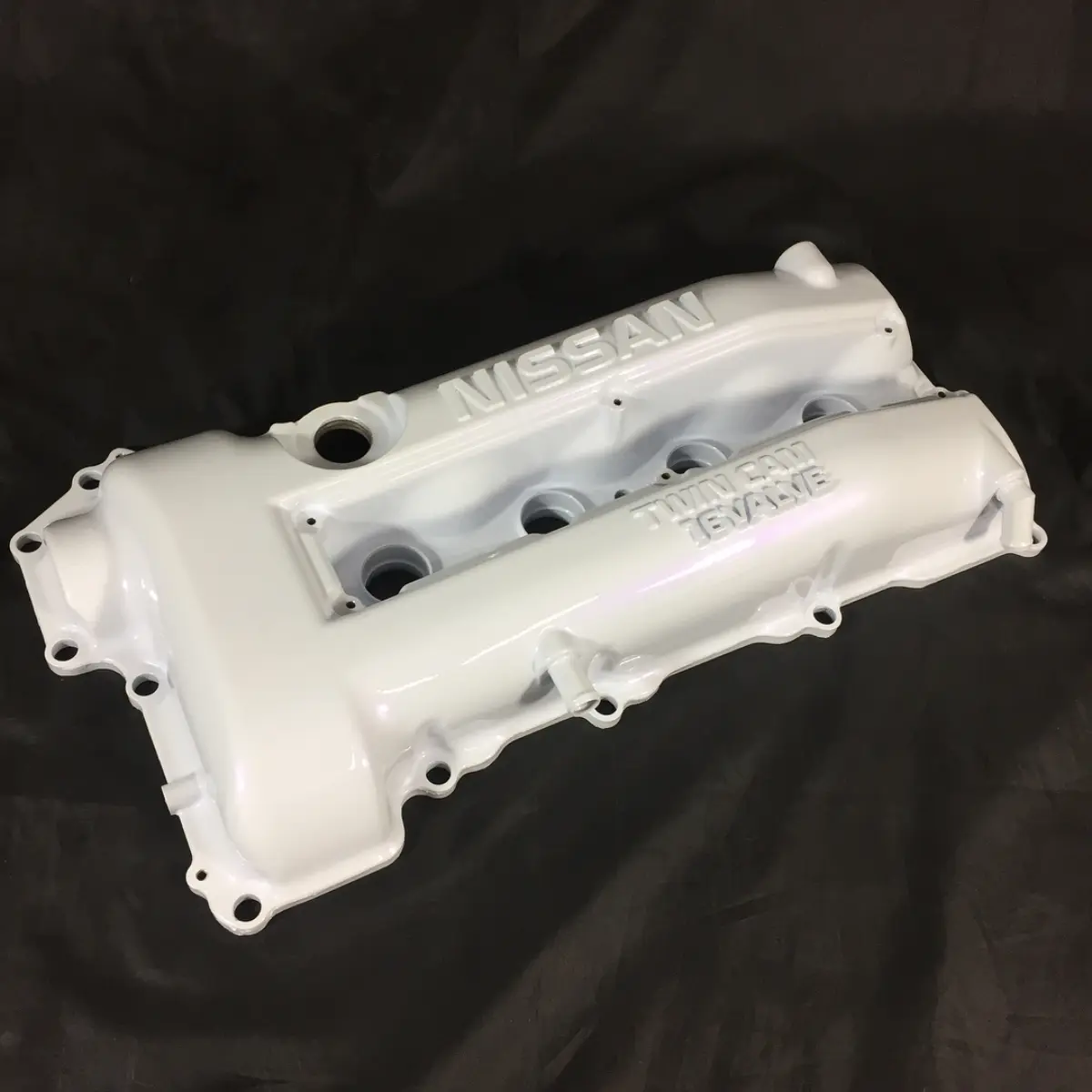 Valve cover refinished in pearlized violet. Swipe to see what it looked like before!